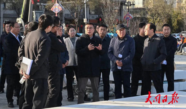 张强深入古城调研